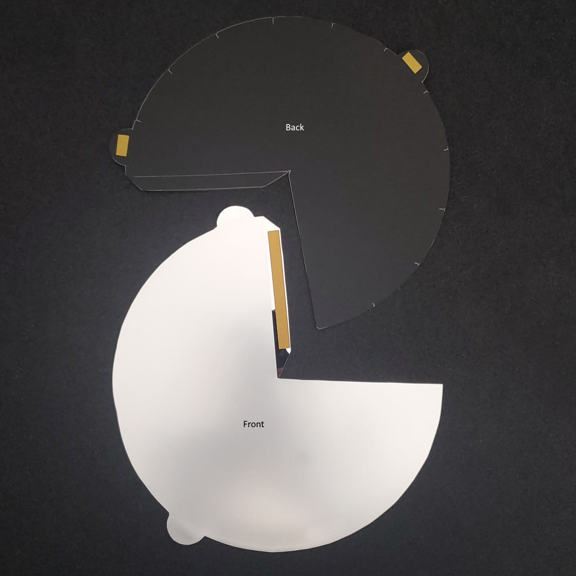 Medusa Mirror flat-packed before folding, front and back panels shown